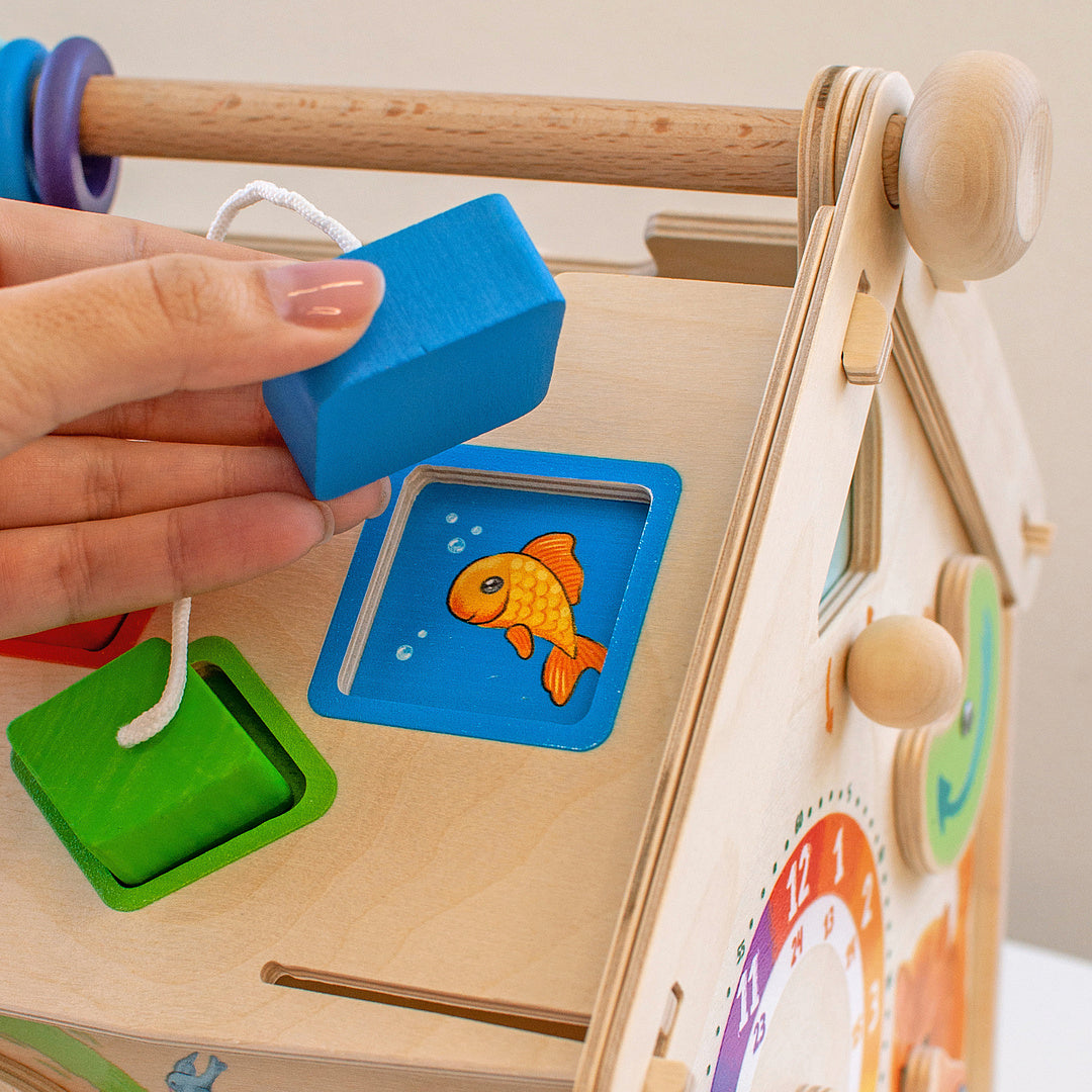 Wooden toy "Busy board house"