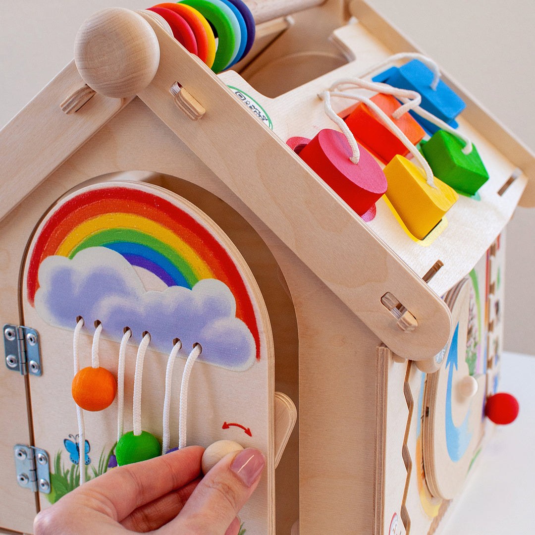 Wooden toy "Busy board house"