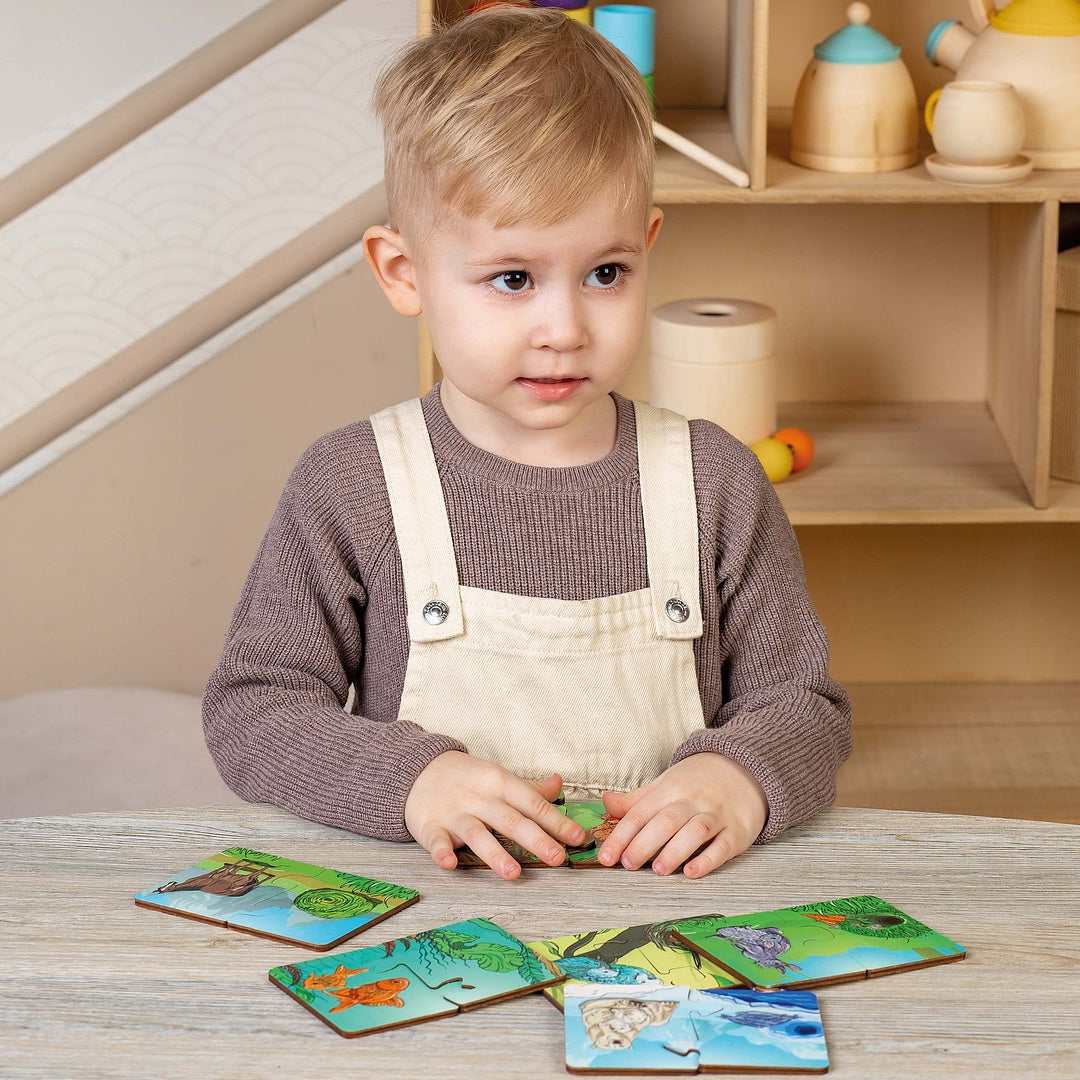 Puzzle board game "Who eats what and where do they live"